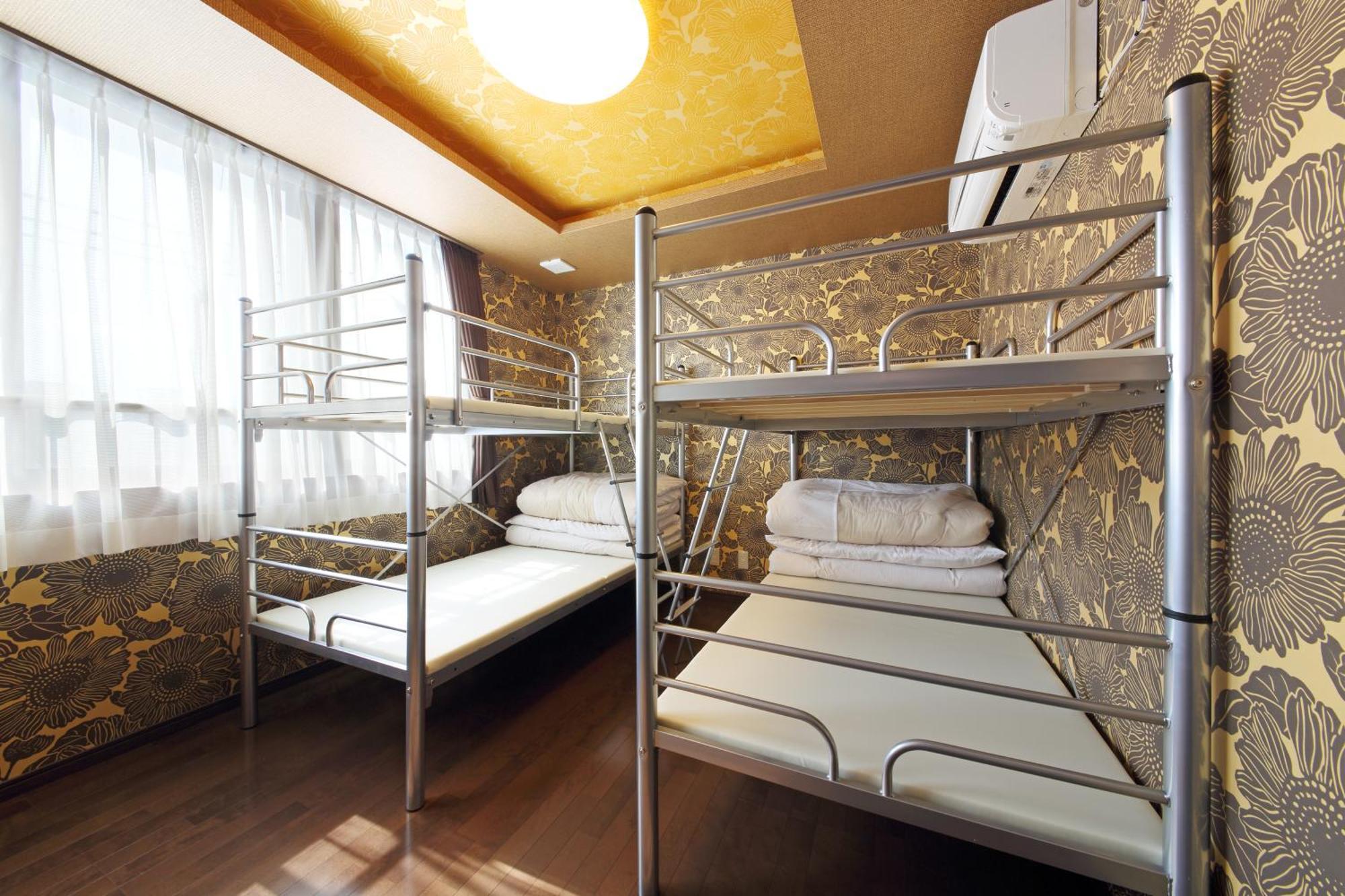 Guesthouse Tiga Kumamoto Phòng bức ảnh