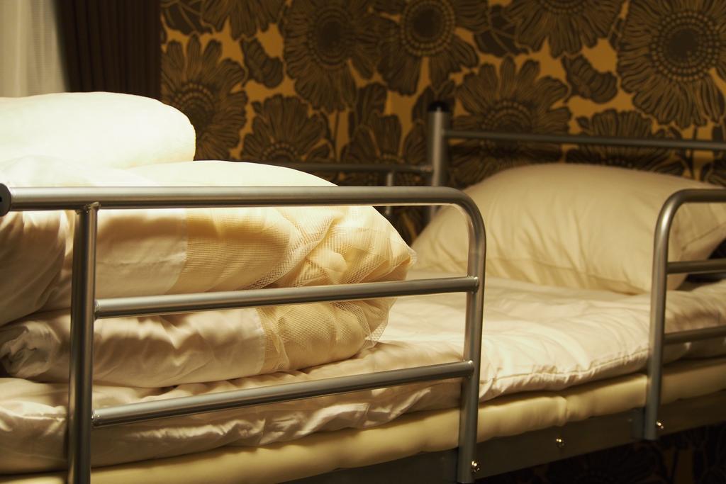 Guesthouse Tiga Kumamoto Phòng bức ảnh