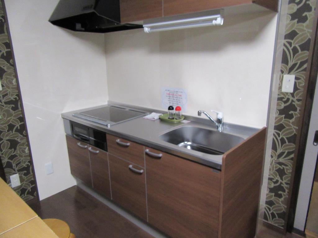 Guesthouse Tiga Kumamoto Phòng bức ảnh