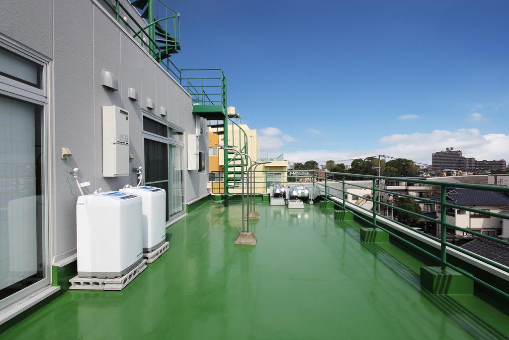 Guesthouse Tiga Kumamoto Phòng bức ảnh