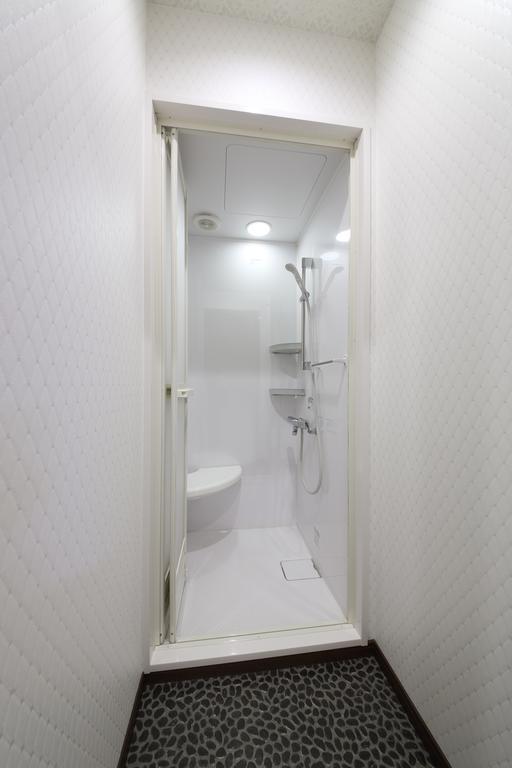 Guesthouse Tiga Kumamoto Phòng bức ảnh